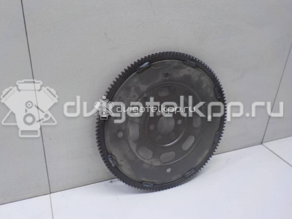 Фото Маховик для двигателя QR20DE для Nissan Primera / X-Trail / Teana / Avenir 131-150 л.с 16V 2.0 л бензин 123318H300 {forloop.counter}}