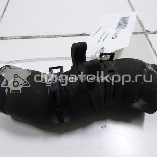 Фото Патрубок радиатора  1K0121101E для Skoda Octavia / Octaviaii 1Z3