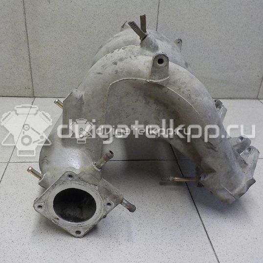 Фото Коллектор впускной для двигателя QG16DE для Nissan Primera / Almera 102-120 л.с 16V 1.6 л бензин 1400395F0B