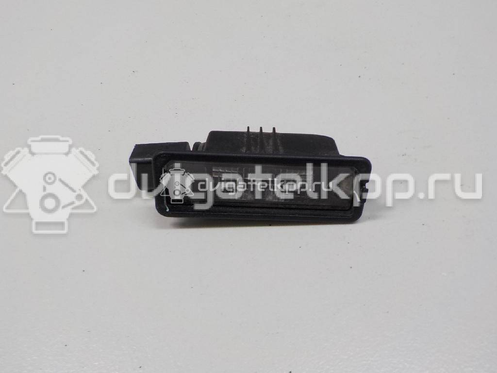 Фото Фонарь подсветки номера  1K8943021 для Volkswagen Scirocco / Polo / Touran / Amarok S1B / New Beetle {forloop.counter}}