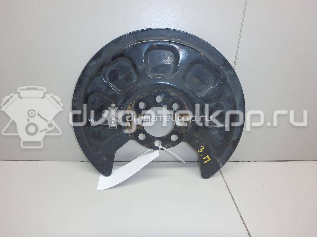 Фото Пыльник тормозного диска  2K0615609A для Volkswagen Caddy {forloop.counter}}