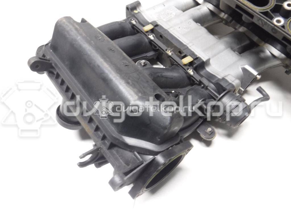 Фото Коллектор впускной для двигателя AGN для Skoda Octavia 125 л.с 20V 1.8 л бензин 06A133210B {forloop.counter}}