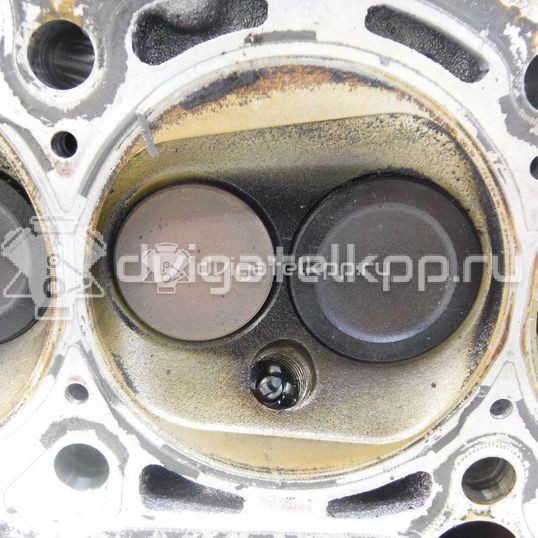 Фото Головка блока для двигателя BFQ для Volkswagen Bora / Golf 102 л.с 8V 1.6 л бензин 06B103351F