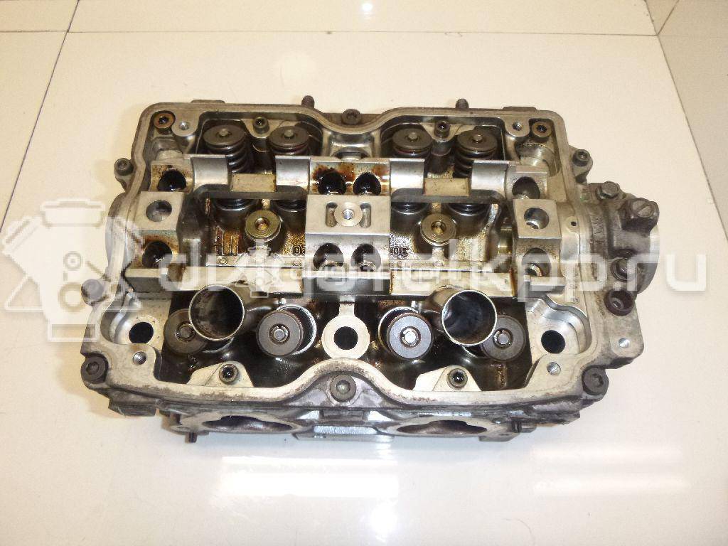 Фото Головка блока для двигателя EJ20 (Turbo) для Subaru Impreza 211-250 л.с 16V 2.0 л бензин 11063AA910 {forloop.counter}}