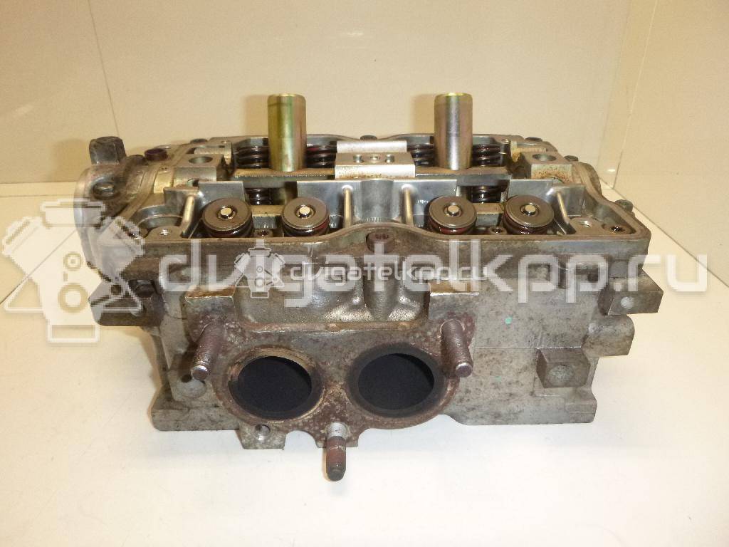 Фото Головка блока для двигателя EJ20 (Turbo) для Subaru Impreza 211-250 л.с 16V 2.0 л бензин 11063AA910 {forloop.counter}}