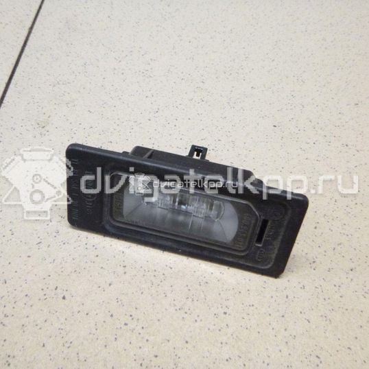 Фото Фонарь подсветки номера  4G0943021 для Audi A4 / A6 / A3 / A5 / Tt