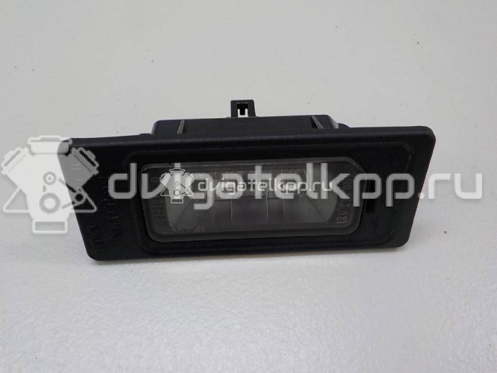 Фото Фонарь подсветки номера  4G0943021 для Audi A4 / A6 / A3 / A5 / Tt {forloop.counter}}