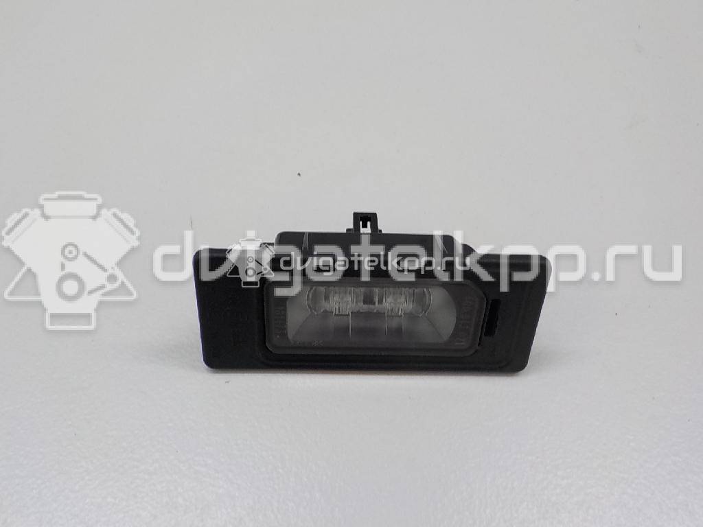 Фото Фонарь подсветки номера  4G0943021 для Audi A4 / A6 / A3 / A5 / Tt {forloop.counter}}