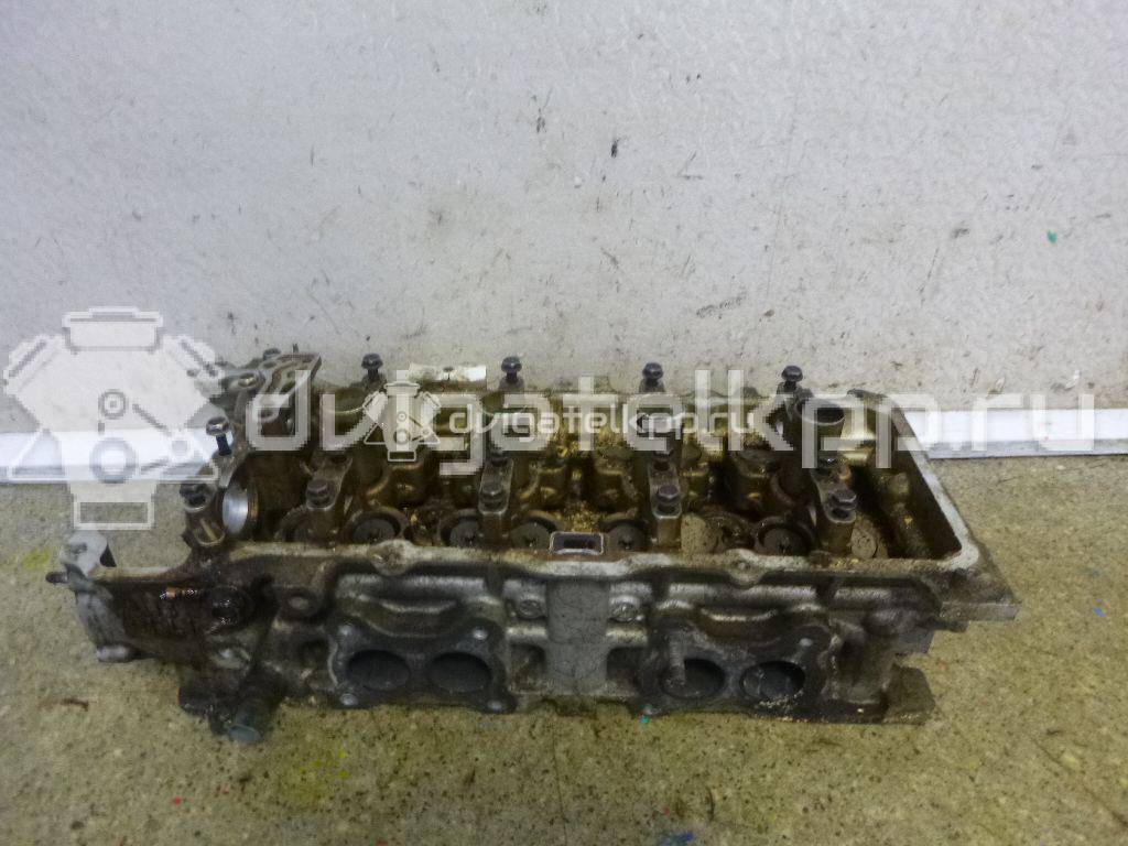 Фото Головка блока для двигателя QG18DE для Nissan Primera / Almera 106-128 л.с 16V 1.8 л бензин 11040AU310 {forloop.counter}}