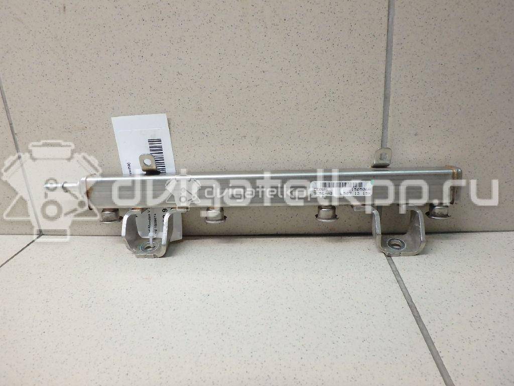 Фото Рейка топливная (рампа) для двигателя BP (DOHC) для Mazda / Ford Australia / Eunos 125-130 л.с 16V 1.8 л бензин 1509674 {forloop.counter}}