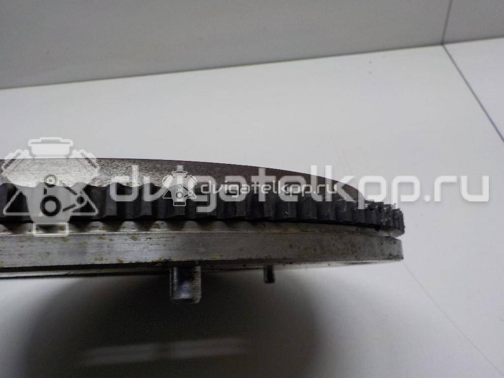 Фото Маховик для двигателя G4EE для Hyundai (Beijing) / Kia 95 л.с 16V 1.4 л бензин 2320026101 {forloop.counter}}