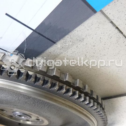 Фото Маховик для двигателя G4ED для Hyundai (Beijing) / Hyundai / Kia 105-112 л.с 16V 1.6 л бензин 0K2N111500