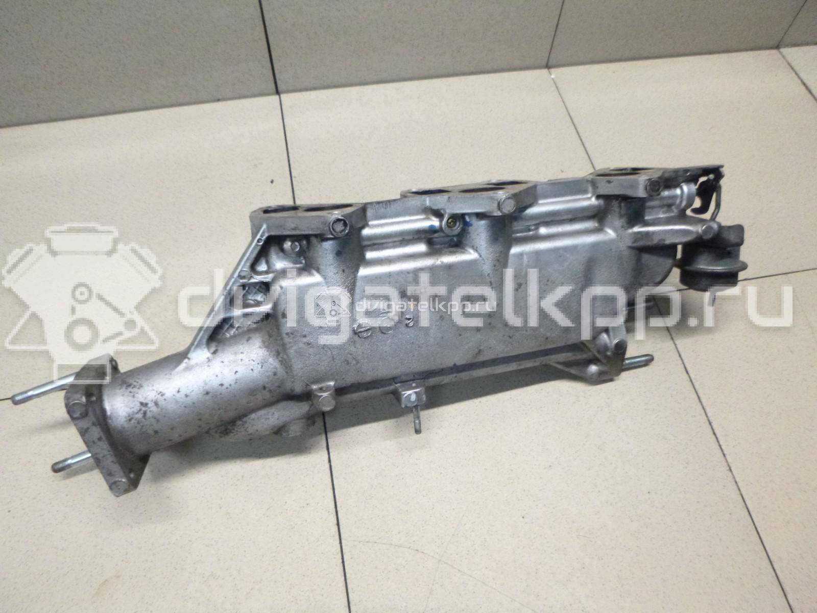 Фото Коллектор впускной для двигателя WL для Volkswagen / Mazda / Ford Asia / Oceania 75 л.с 8V 1.7 л нормальный бензин (91) неэтилированный WE0513100 {forloop.counter}}