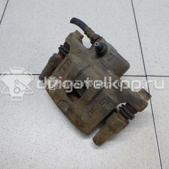 Фото Суппорт тормозной задний левый  MR955065 для Mitsubishi Lancer / Outlander / Grandis Na W