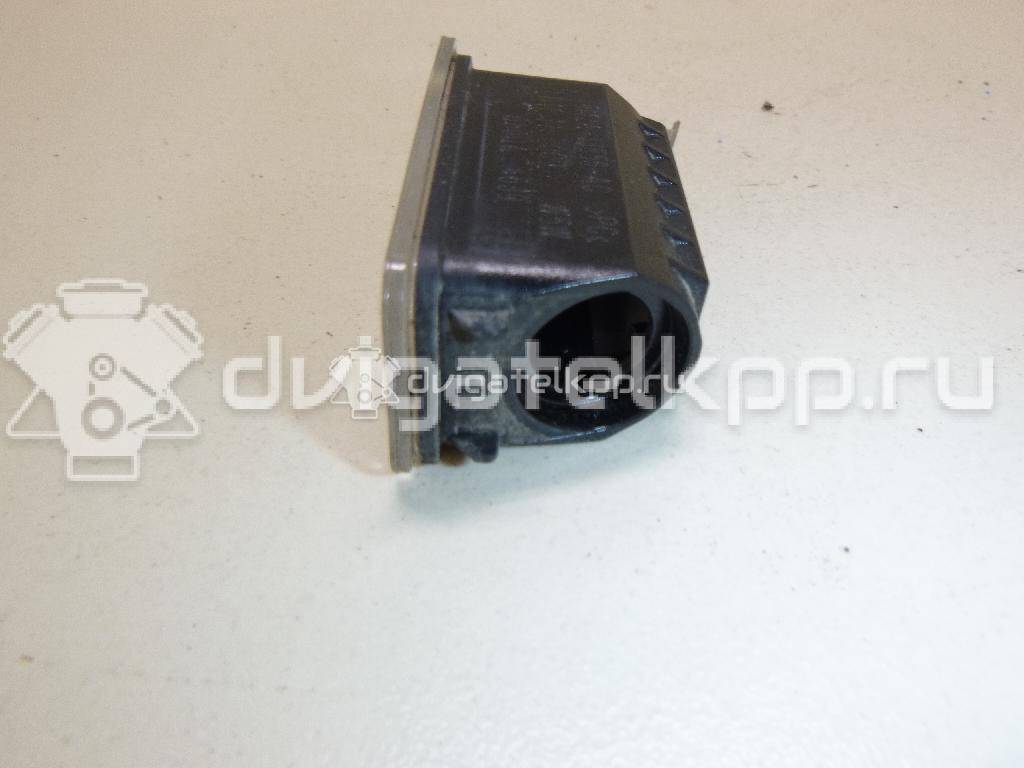 Фото Фонарь подсветки номера  5105886 для Ford Fiesta / Focus / Tourneo / C-Max / Ka {forloop.counter}}