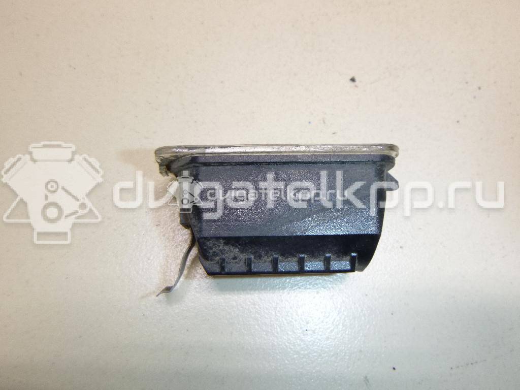 Фото Фонарь подсветки номера  5105886 для Ford Fiesta / Focus / Tourneo / C-Max / Ka {forloop.counter}}