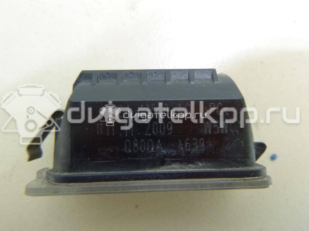 Фото Фонарь подсветки номера  5105886 для Ford Fiesta / Focus / Tourneo / C-Max / Ka {forloop.counter}}