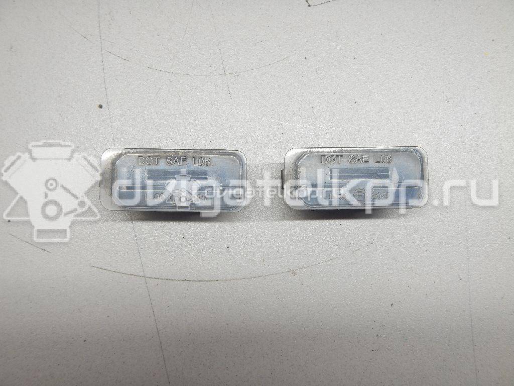 Фото Фонарь подсветки номера  5105886 для Ford Fiesta / Focus / Tourneo / C-Max / Ka {forloop.counter}}