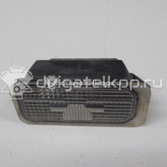 Фото Фонарь подсветки номера  5105886 для Ford Fiesta / Focus / Tourneo / C-Max / Ka