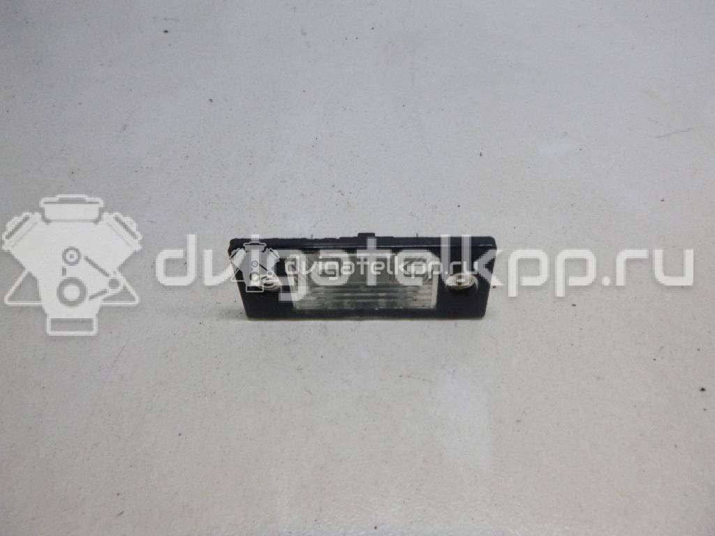 Фото Фонарь подсветки номера  1J5943021D для vw Passat [B5] {forloop.counter}}