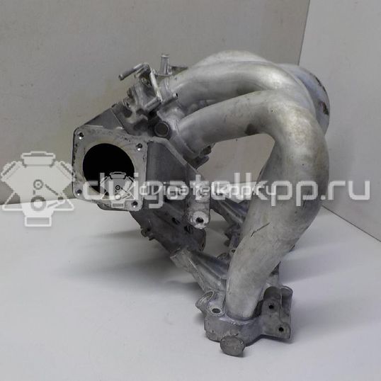 Фото Коллектор впускной для двигателя QG16DE для Nissan Sunny / Bluebird / Avenir / Primera / Almera 102-120 л.с 16V 1.6 л бензин 14010AU300