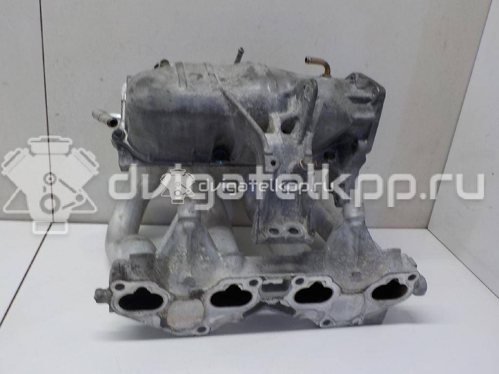 Фото Коллектор впускной для двигателя QG16DE для Nissan Sunny / Bluebird / Avenir / Primera / Almera 102-120 л.с 16V 1.6 л бензин 14010AU300 {forloop.counter}}