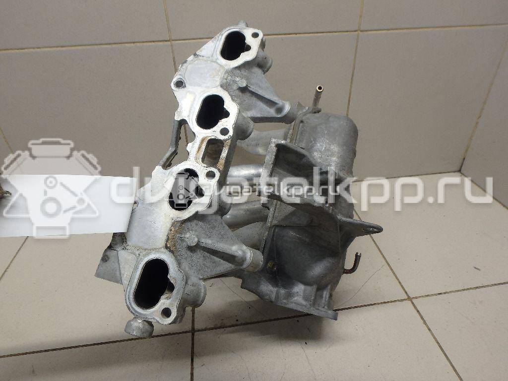 Фото Коллектор впускной для двигателя QG16DE для Nissan Sunny / Bluebird / Avenir / Primera / Almera 102-120 л.с 16V 1.6 л бензин 14010AU300 {forloop.counter}}