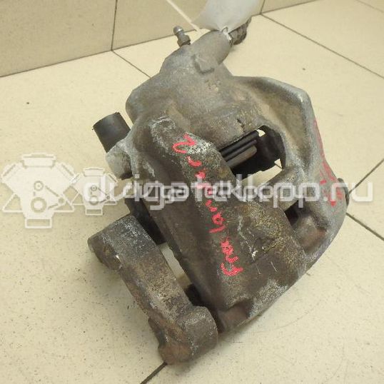 Фото Суппорт тормозной передний левый  LR000569 для Land Rover Freelander / Range Rover / Discovery