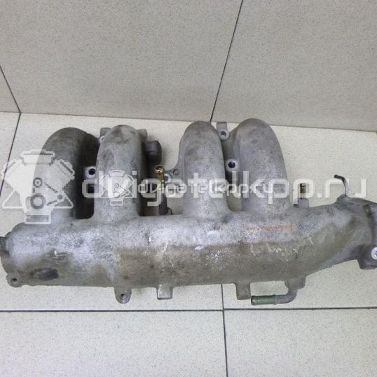 Фото Коллектор впускной для двигателя QR25DE для Nissan (Dongfeng) / Suzuki / Mitsuoka / Nissan 141-182 л.с 16V 2.5 л бензин 14010AE001