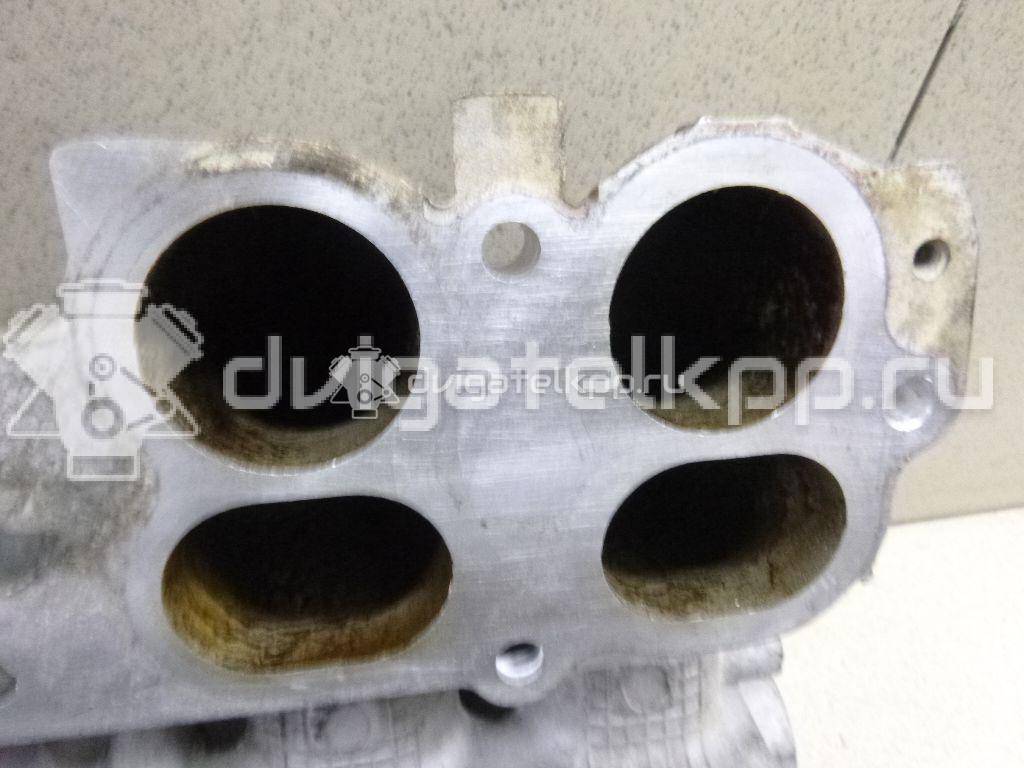 Фото Коллектор впускной для двигателя QR25DE для Nissan (Dongfeng) / Suzuki / Mitsuoka / Nissan 141-182 л.с 16V 2.5 л бензин 14010AE001 {forloop.counter}}