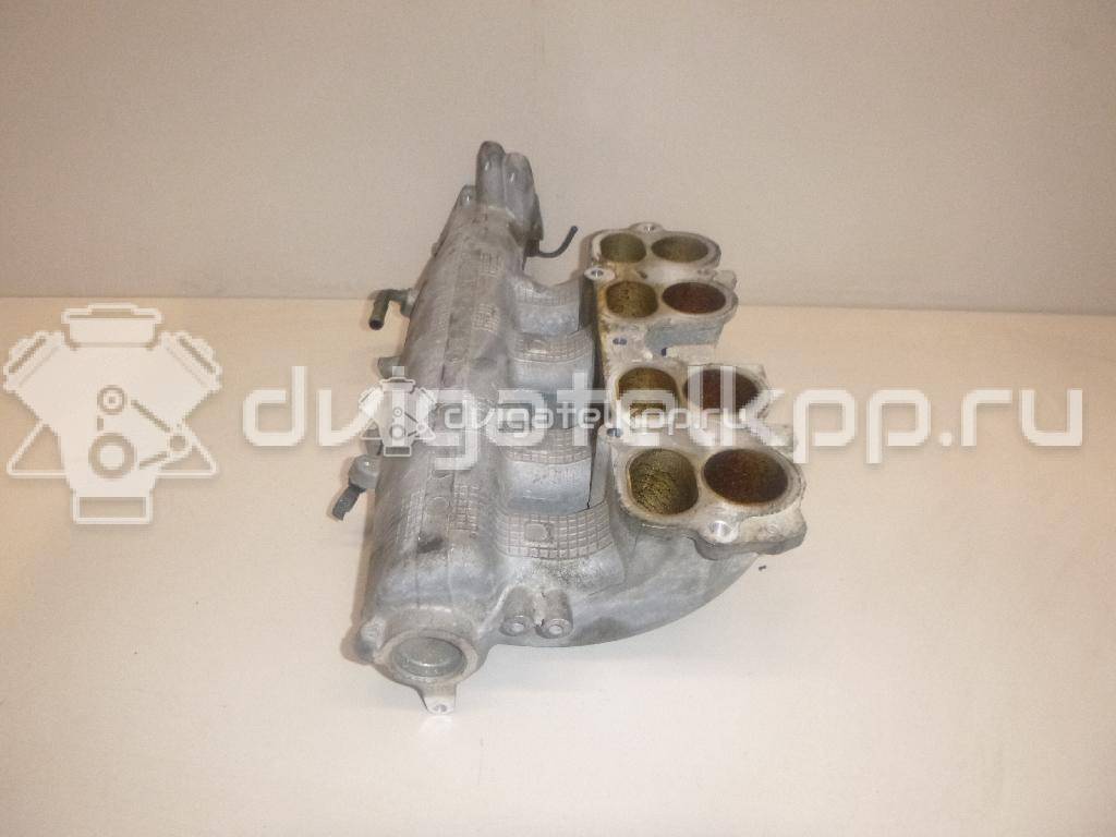 Фото Коллектор впускной для двигателя QR25DE для Nissan (Dongfeng) / Suzuki / Mitsuoka / Nissan 141-182 л.с 16V 2.5 л бензин 14010AE001 {forloop.counter}}