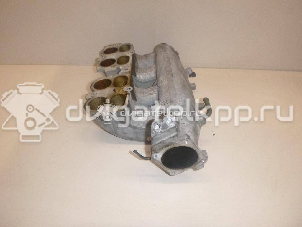 Фото Коллектор впускной для двигателя QR25DE для Nissan (Dongfeng) / Suzuki / Mitsuoka / Nissan 141-182 л.с 16V 2.5 л бензин 14010AE001 {forloop.counter}}