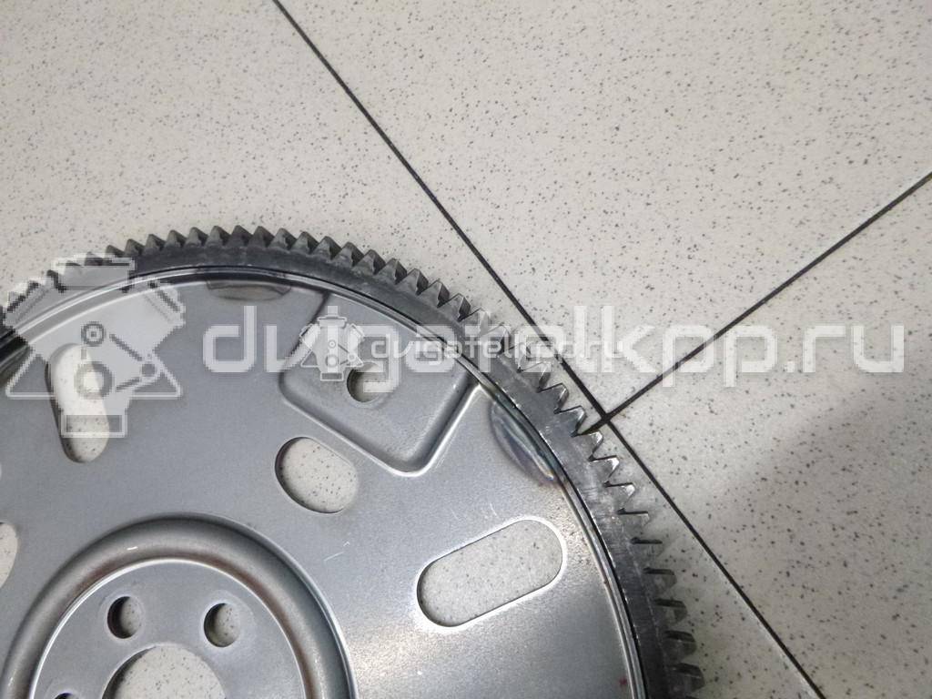 Фото Маховик для двигателя QR25DE для Nissan (Dongfeng) / Suzuki / Mitsuoka / Nissan 147-186 л.с 16V 2.5 л бензин 123313TU0A {forloop.counter}}