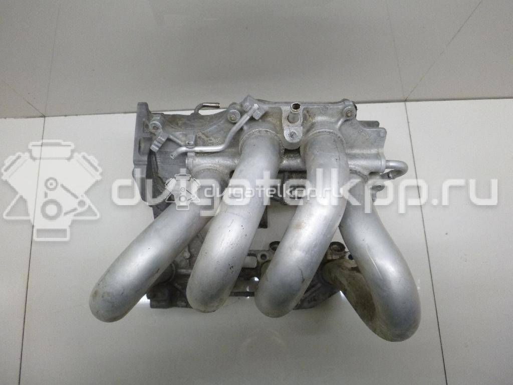 Фото Коллектор впускной для двигателя QG16DE для Nissan Sunny / Bluebird / Avenir / Primera / Almera 102-120 л.с 16V 1.6 л бензин 14010AU300 {forloop.counter}}