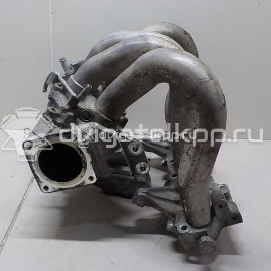 Фото Коллектор впускной для двигателя QG16DE для Nissan Sunny / Bluebird / Avenir / Primera / Almera 102-120 л.с 16V 1.6 л бензин 14010AU300