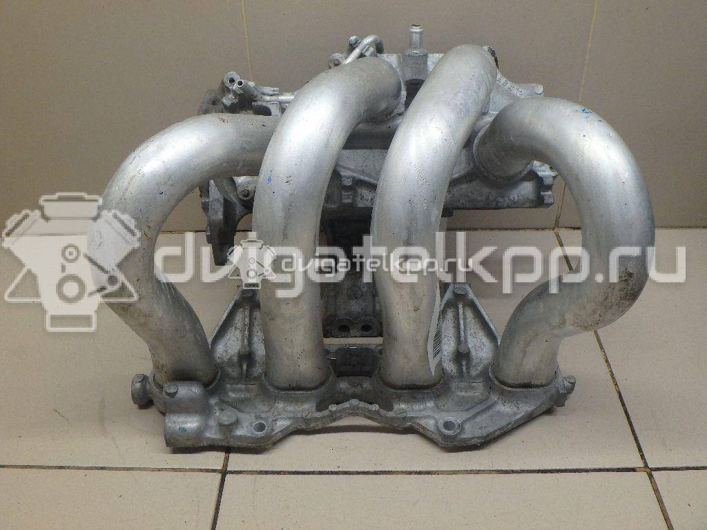 Фото Коллектор впускной для двигателя QG16DE для Nissan Sunny / Bluebird / Avenir / Primera / Almera 102-120 л.с 16V 1.6 л бензин 14010AU300 {forloop.counter}}