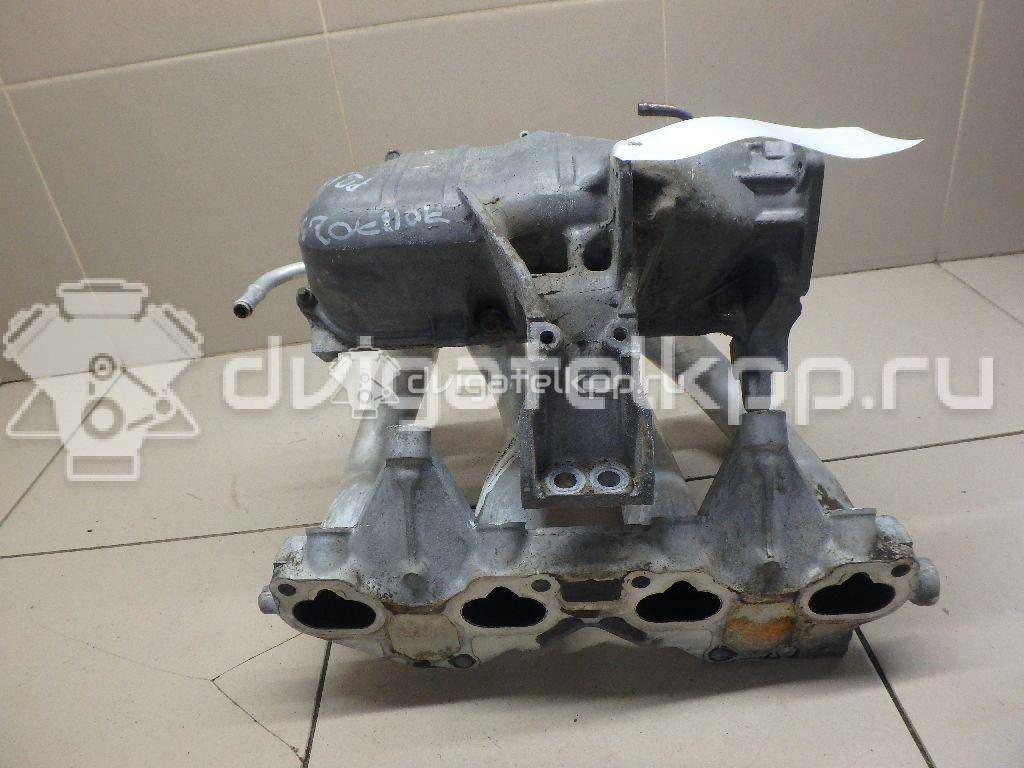 Фото Коллектор впускной для двигателя QG16DE для Nissan Sunny / Bluebird / Avenir / Primera / Almera 102-120 л.с 16V 1.6 л бензин 14010AU300 {forloop.counter}}