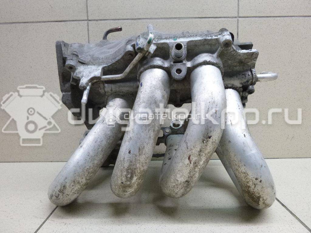 Фото Коллектор впускной для двигателя QG16DE для Nissan Sunny / Bluebird / Avenir / Primera / Almera 102-120 л.с 16V 1.6 л бензин 14010AU300 {forloop.counter}}