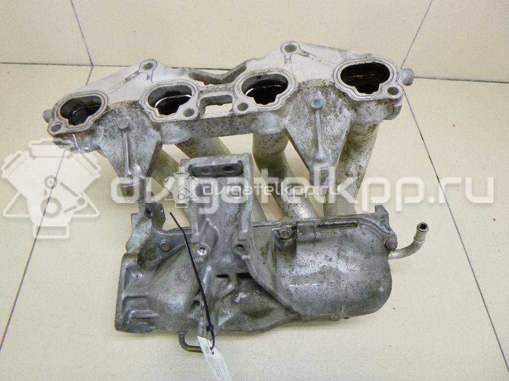 Фото Коллектор впускной для двигателя QG16DE для Nissan Sunny / Bluebird / Avenir / Primera / Almera 102-120 л.с 16V 1.6 л бензин 14010AU300 {forloop.counter}}