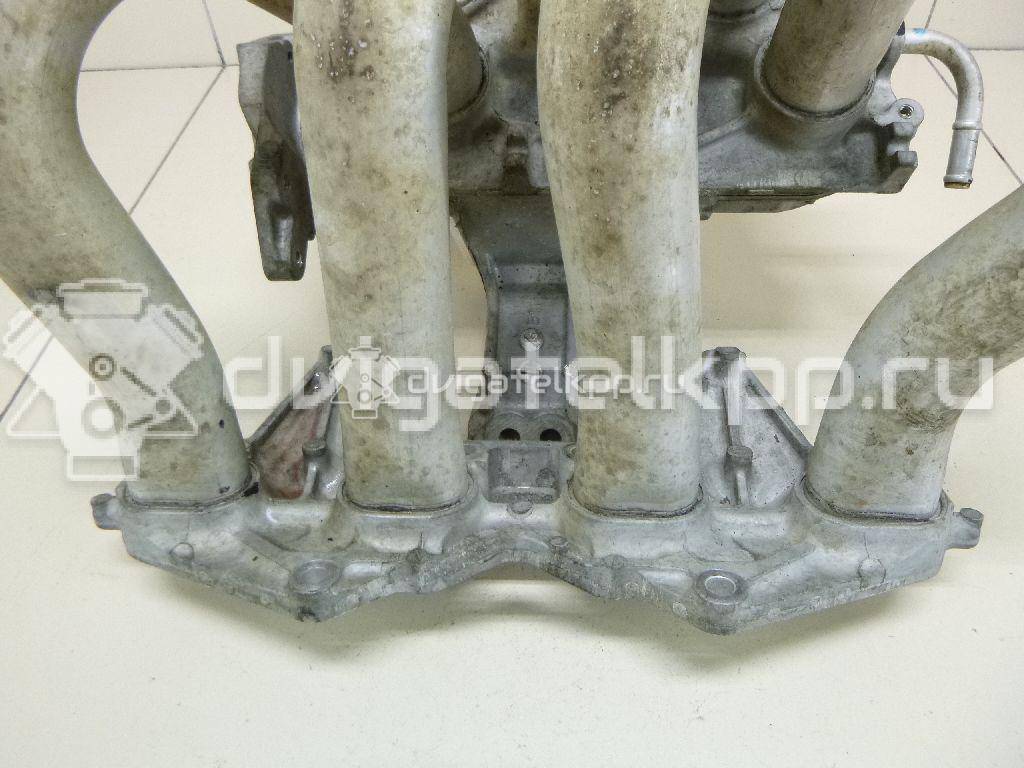 Фото Коллектор впускной для двигателя QG16DE для Nissan Sunny / Bluebird / Avenir / Primera / Almera 102-120 л.с 16V 1.6 л бензин 14010AU300 {forloop.counter}}