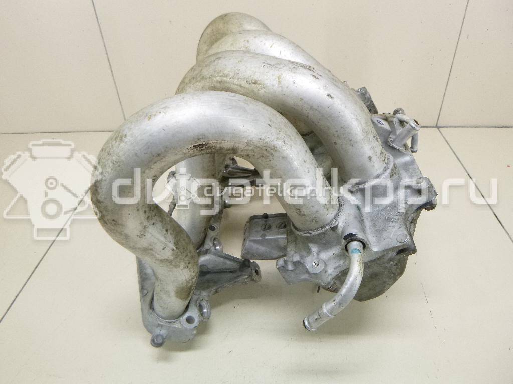 Фото Коллектор впускной для двигателя QG16DE для Nissan Sunny / Bluebird / Avenir / Primera / Almera 102-120 л.с 16V 1.6 л бензин 14010AU300 {forloop.counter}}