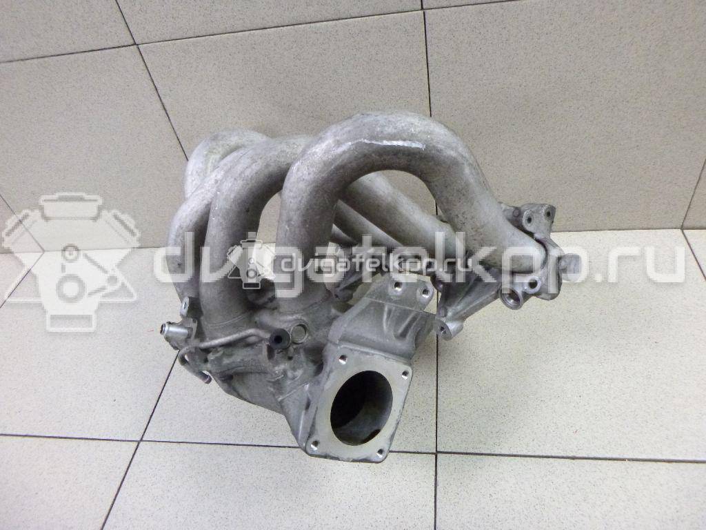 Фото Коллектор впускной для двигателя QG16DE для Nissan Sunny / Bluebird / Avenir / Primera / Almera 102-120 л.с 16V 1.6 л бензин 14010AU300 {forloop.counter}}