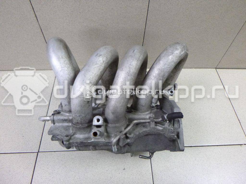 Фото Коллектор впускной для двигателя QG16DE для Nissan Sunny / Bluebird / Avenir / Primera / Almera 102-120 л.с 16V 1.6 л бензин 14010AU300 {forloop.counter}}