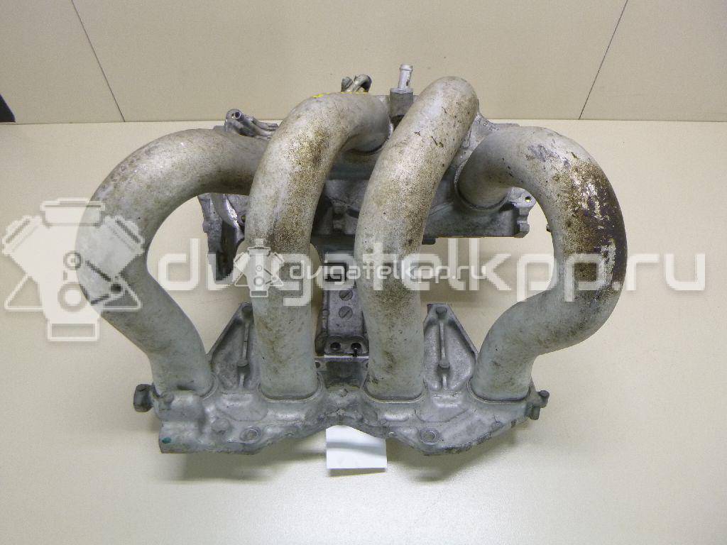 Фото Коллектор впускной для двигателя QG16DE для Nissan Sunny / Bluebird / Avenir / Primera / Almera 102-120 л.с 16V 1.6 л бензин 14010AU300 {forloop.counter}}