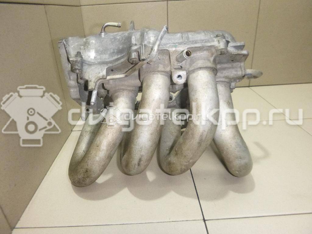 Фото Коллектор впускной для двигателя QG16DE для Nissan Sunny / Bluebird / Avenir / Primera / Almera 102-120 л.с 16V 1.6 л бензин 14010AU300 {forloop.counter}}