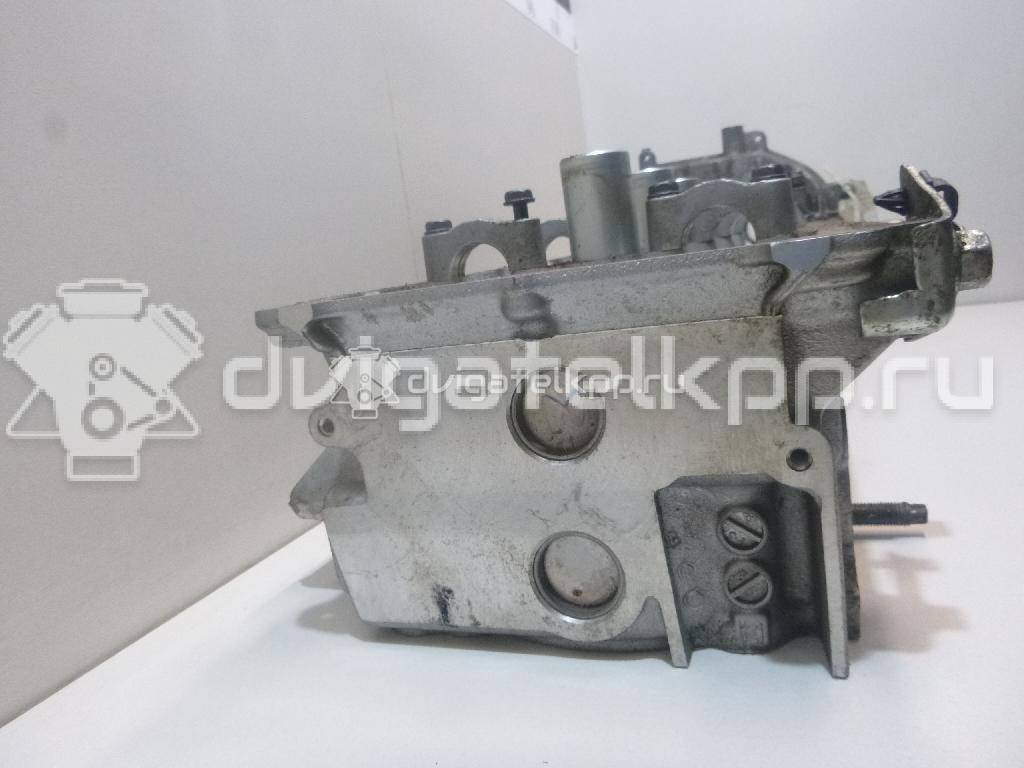 Фото Головка блока для двигателя VK56DE для Infiniti / Nissan 309-324 л.с 32V 5.6 л бензин 11040ZE00A {forloop.counter}}