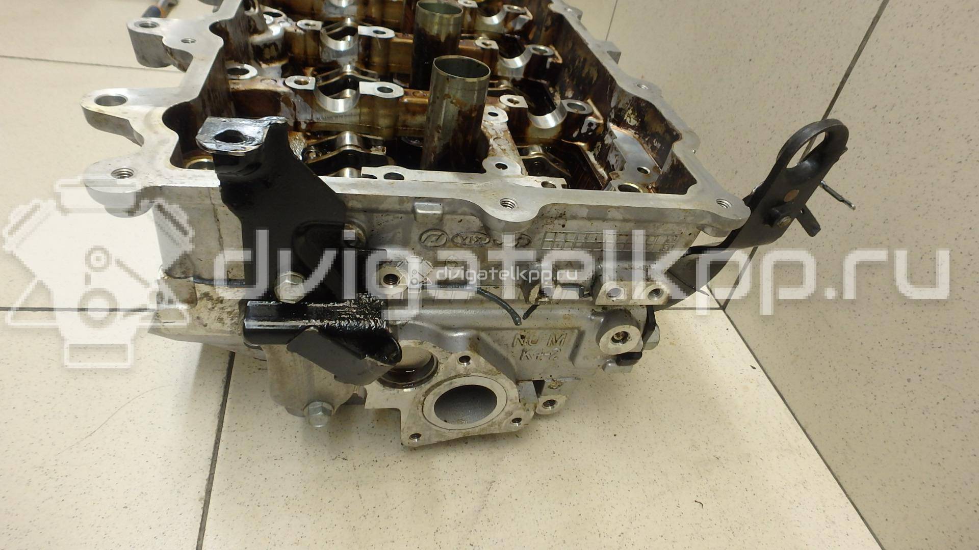 Фото Головка блока для двигателя FE (16V) для Kia Sportage / Clarus / Retona Ce 118-148 л.с 16V 2.0 л бензин 221102E002 {forloop.counter}}