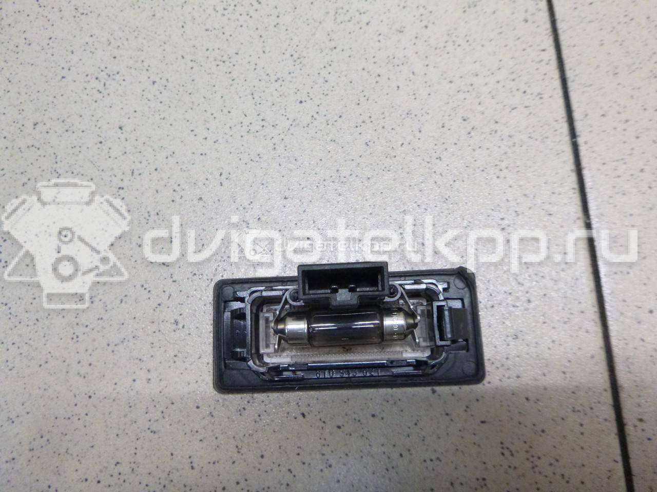 Фото Фонарь подсветки номера  8T0943021 для vw Passat [B6] {forloop.counter}}