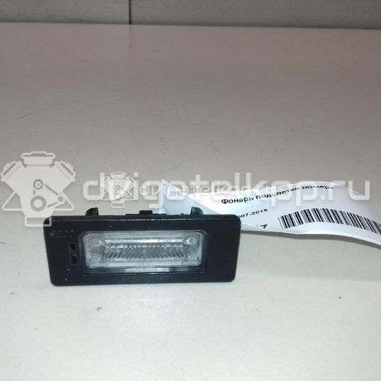 Фото Фонарь подсветки номера  8T0943021 для vw Passat [B6]