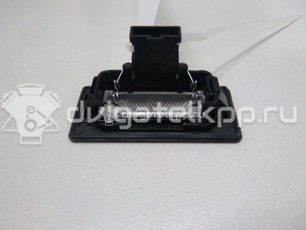 Фото Фонарь подсветки номера  8T0943021 для vw Passat [B6] {forloop.counter}}